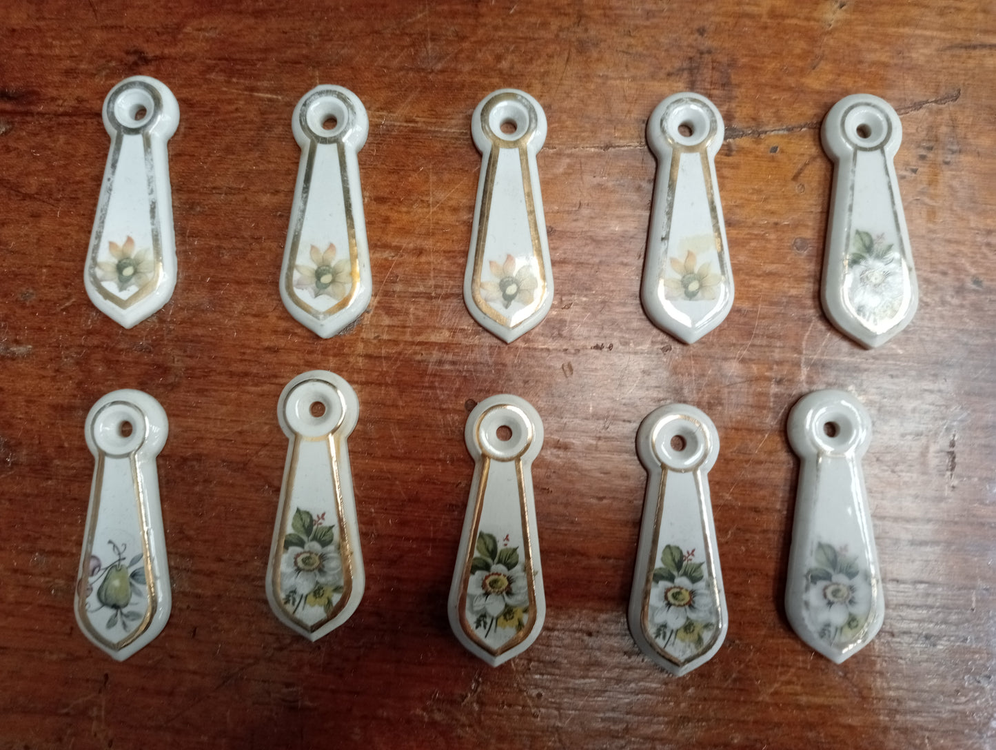 Lot of 5 pairs of ceramic keyhole covers F