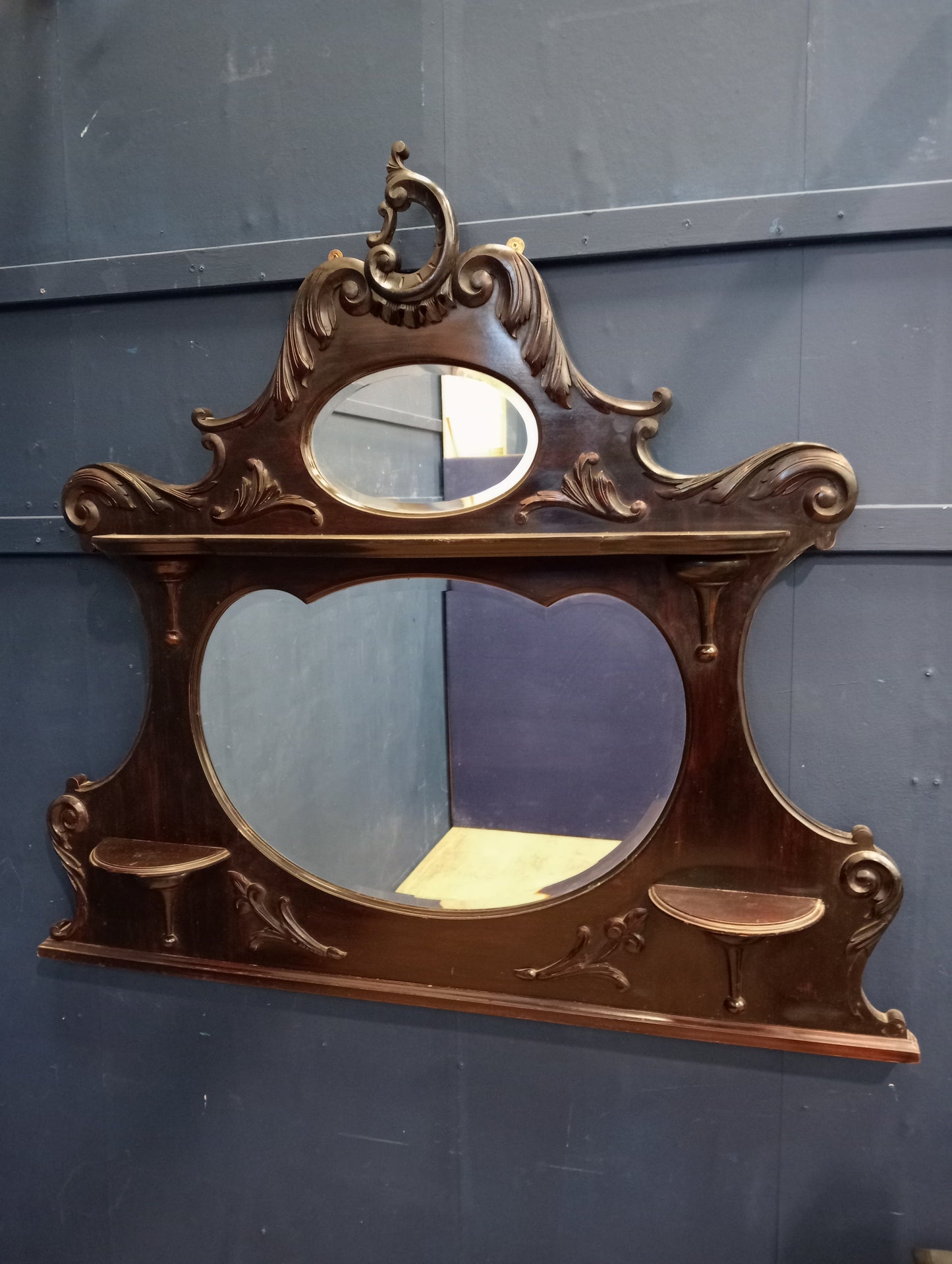 Mahogany carved bevelled glass wall mirror