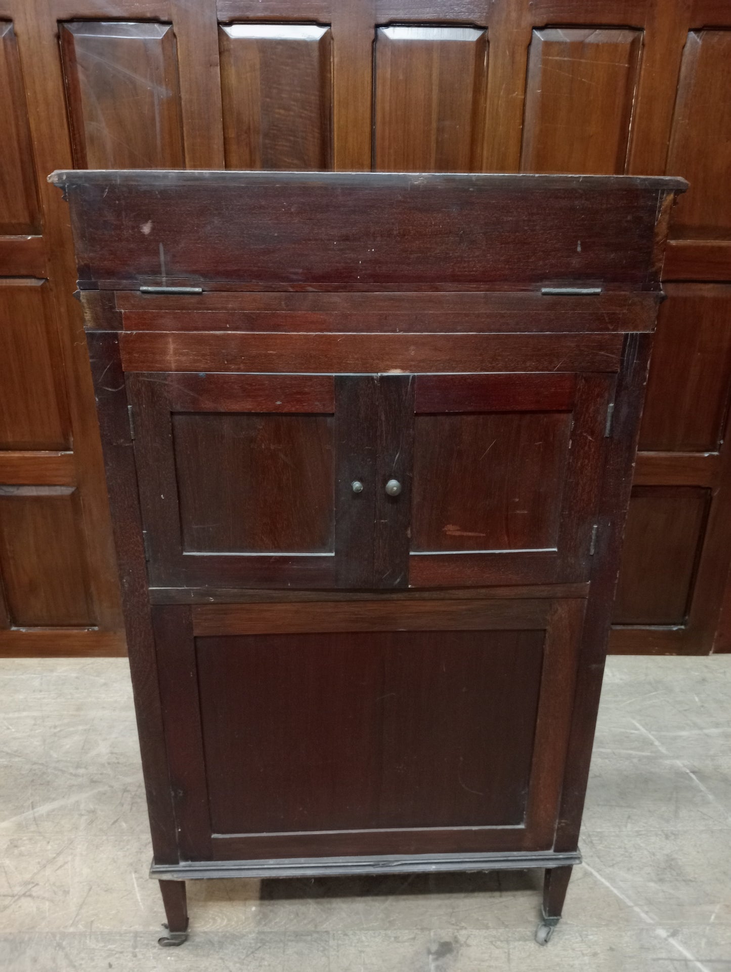 Mahogany gramophone cabinet on castors