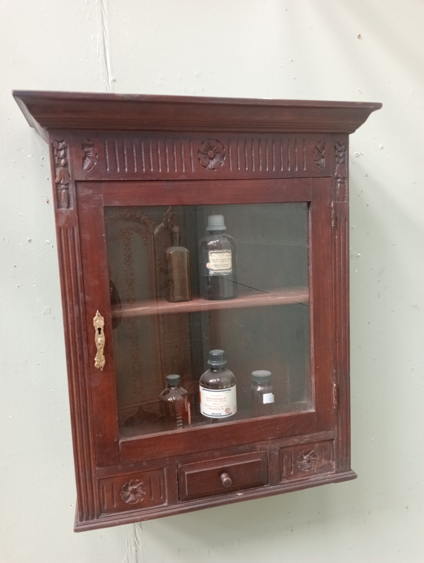 Mahogany wall mounted apothecary cabinet