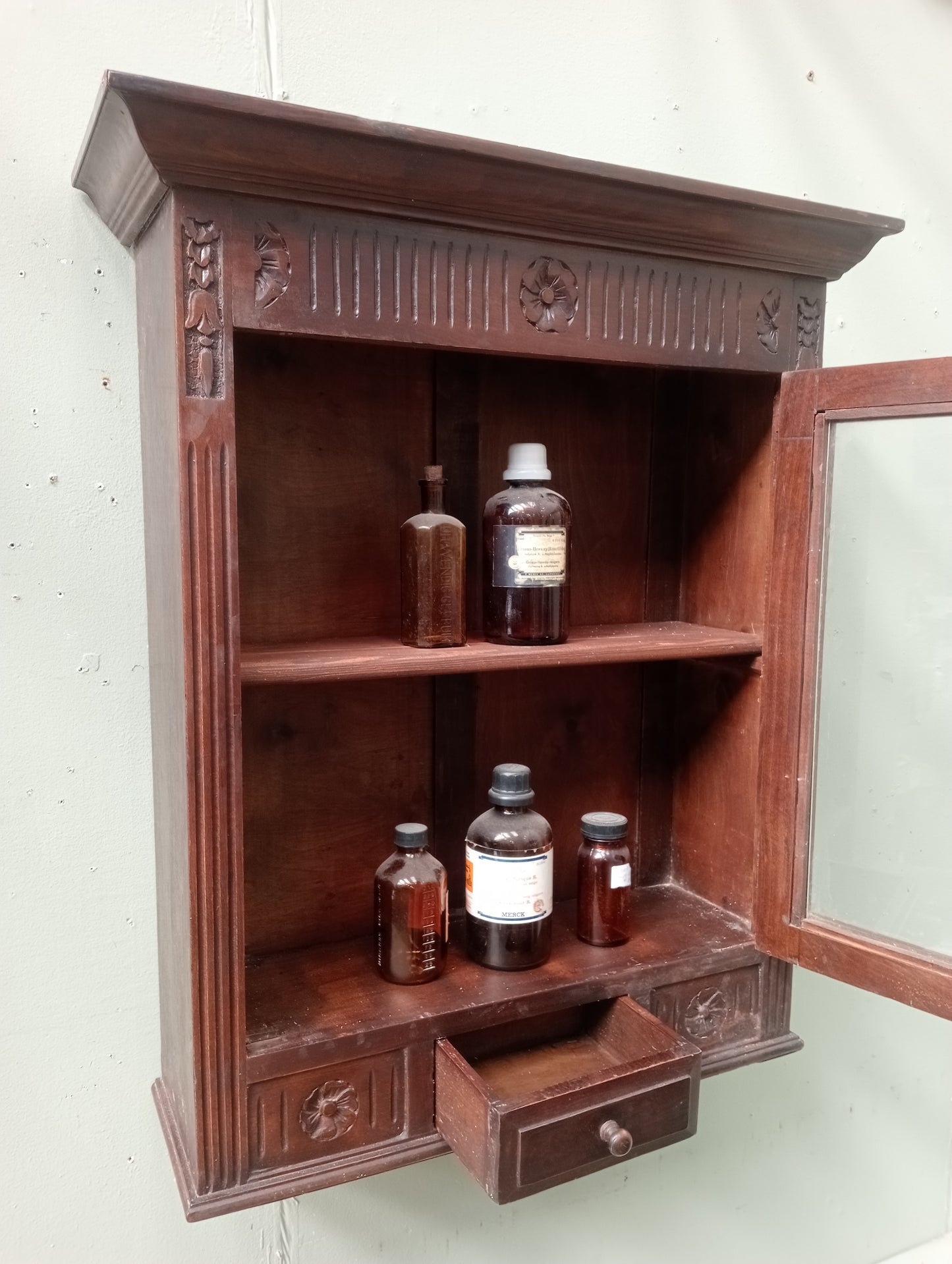 Mahogany wall mounted apothecary cabinet