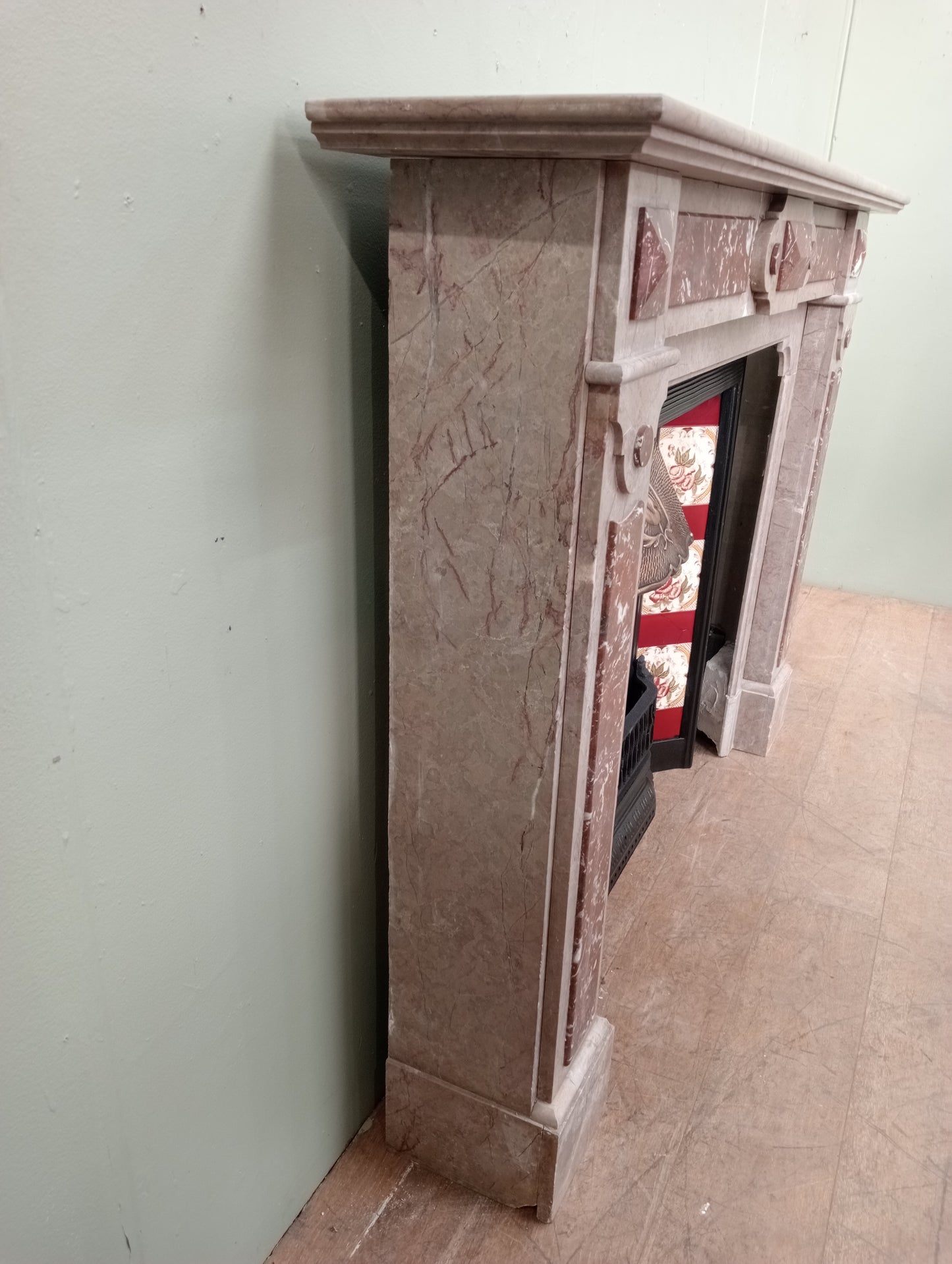 Marble fireplace with tiles cast iron insert