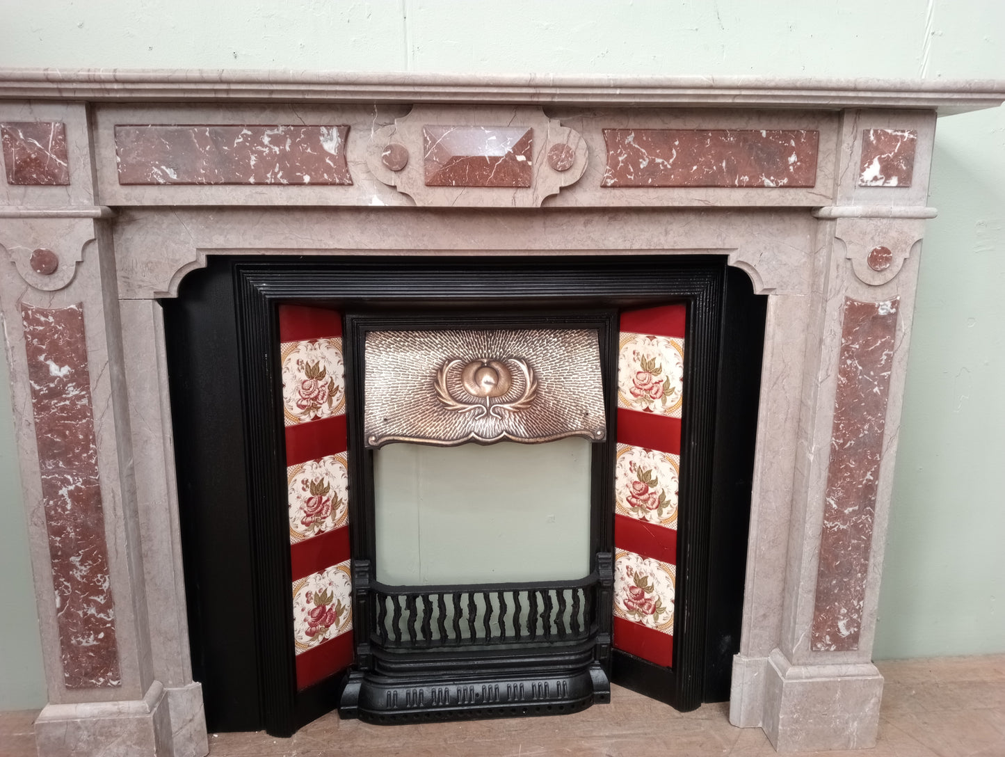 Marble fireplace with tiles cast iron insert