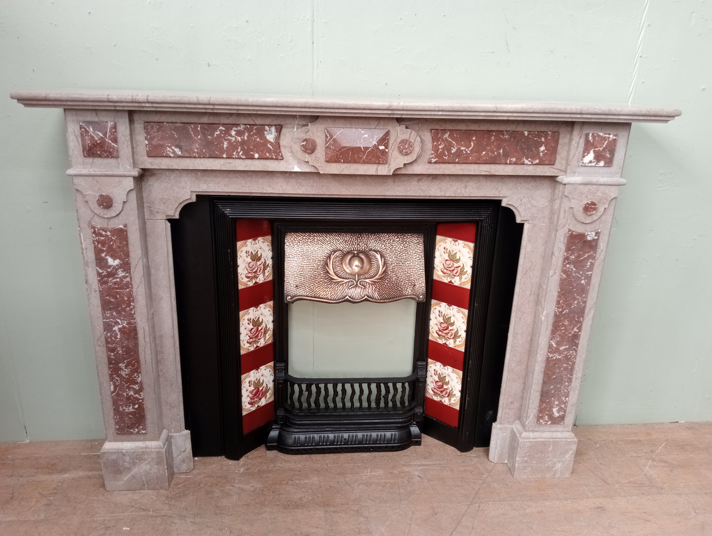 Marble fireplace with tiles cast iron insert