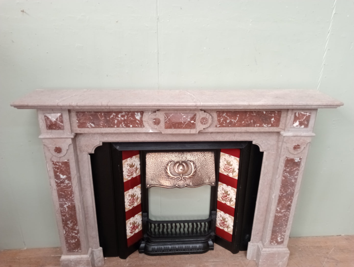 Marble fireplace with tiles cast iron insert