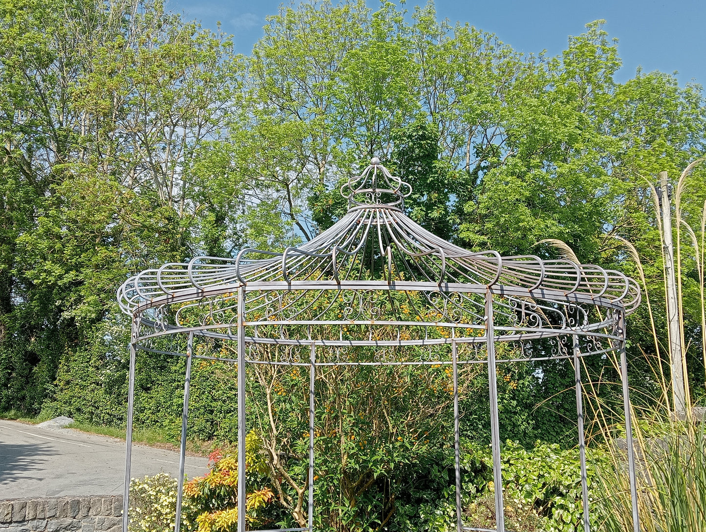Metal garden gazebo with scroll design