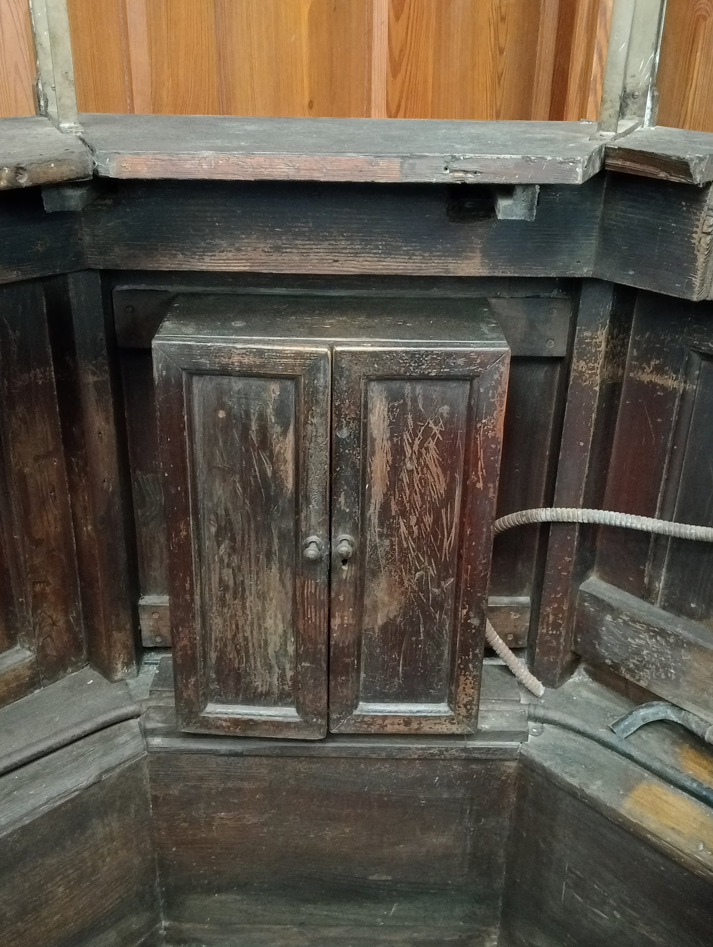 Oak and brass ticket booth