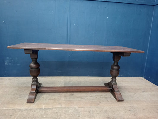 Oak refractory table vintage raised on cup and cover supports with central stretcher