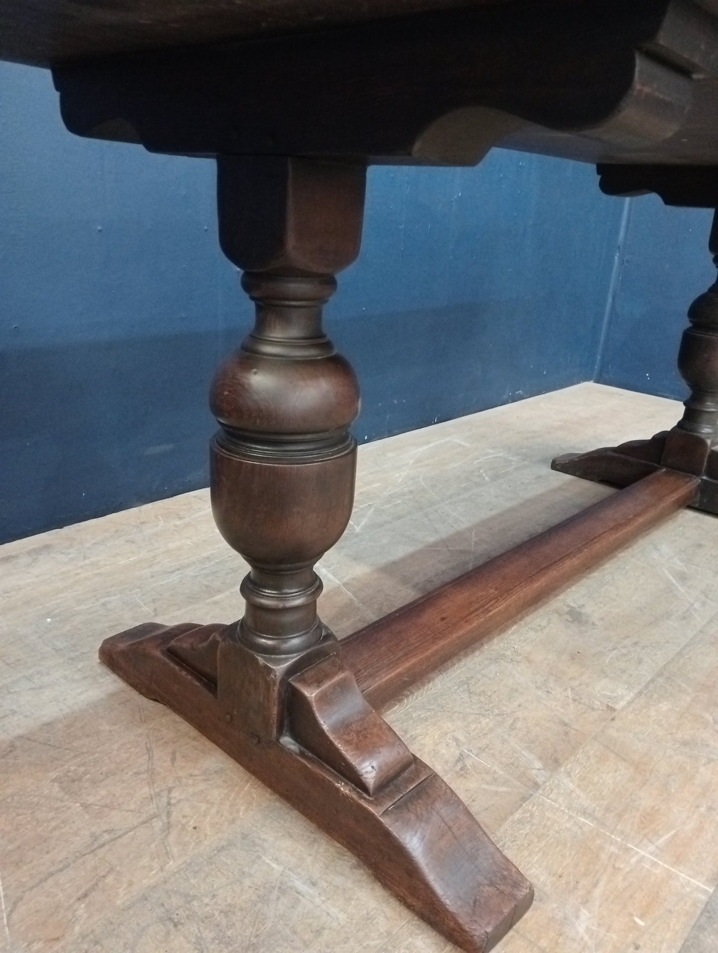Oak refractory table vintage raised on cup and cover supports with central stretcher