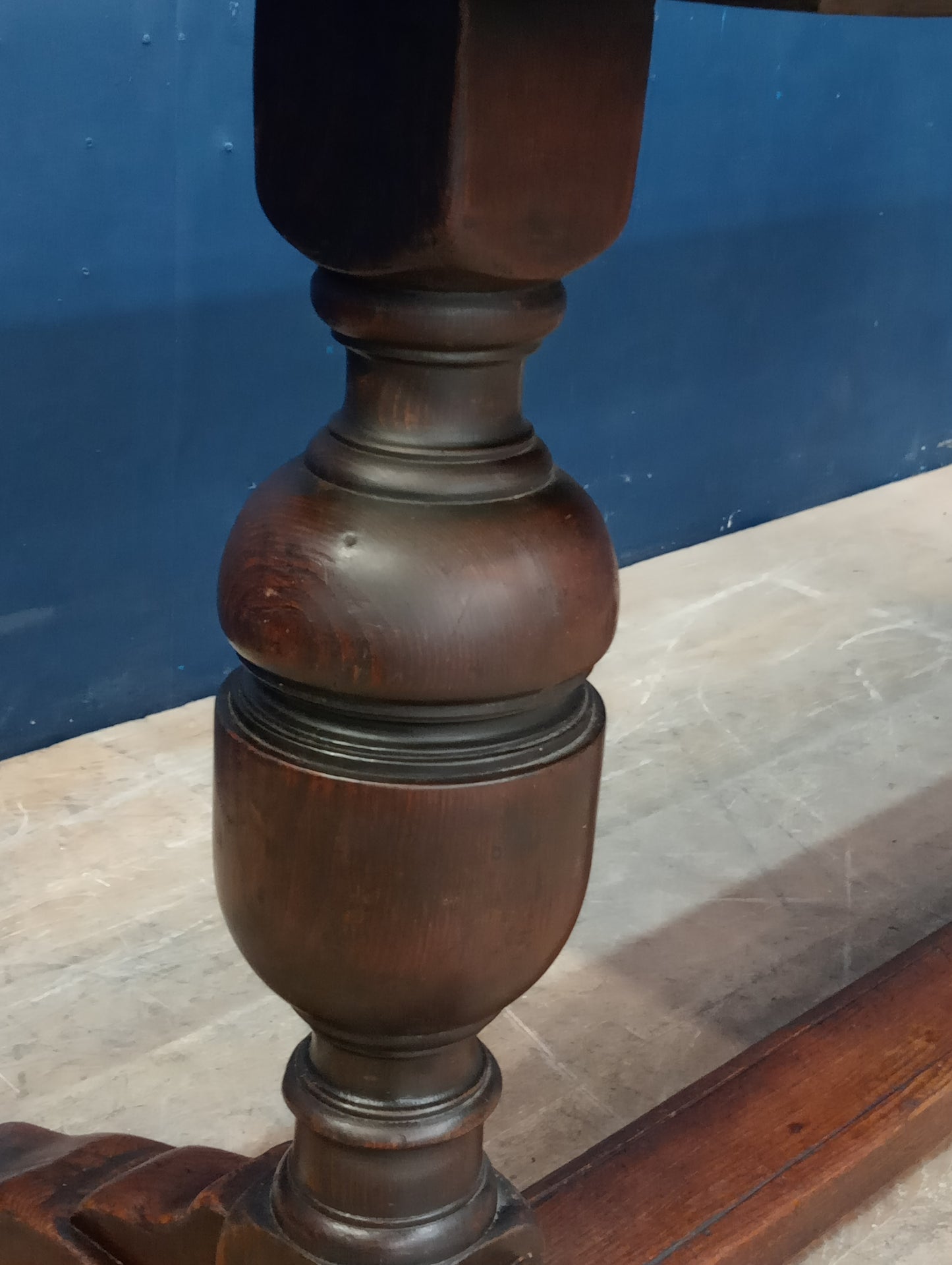 Oak refractory table vintage raised on cup and cover supports with central stretcher