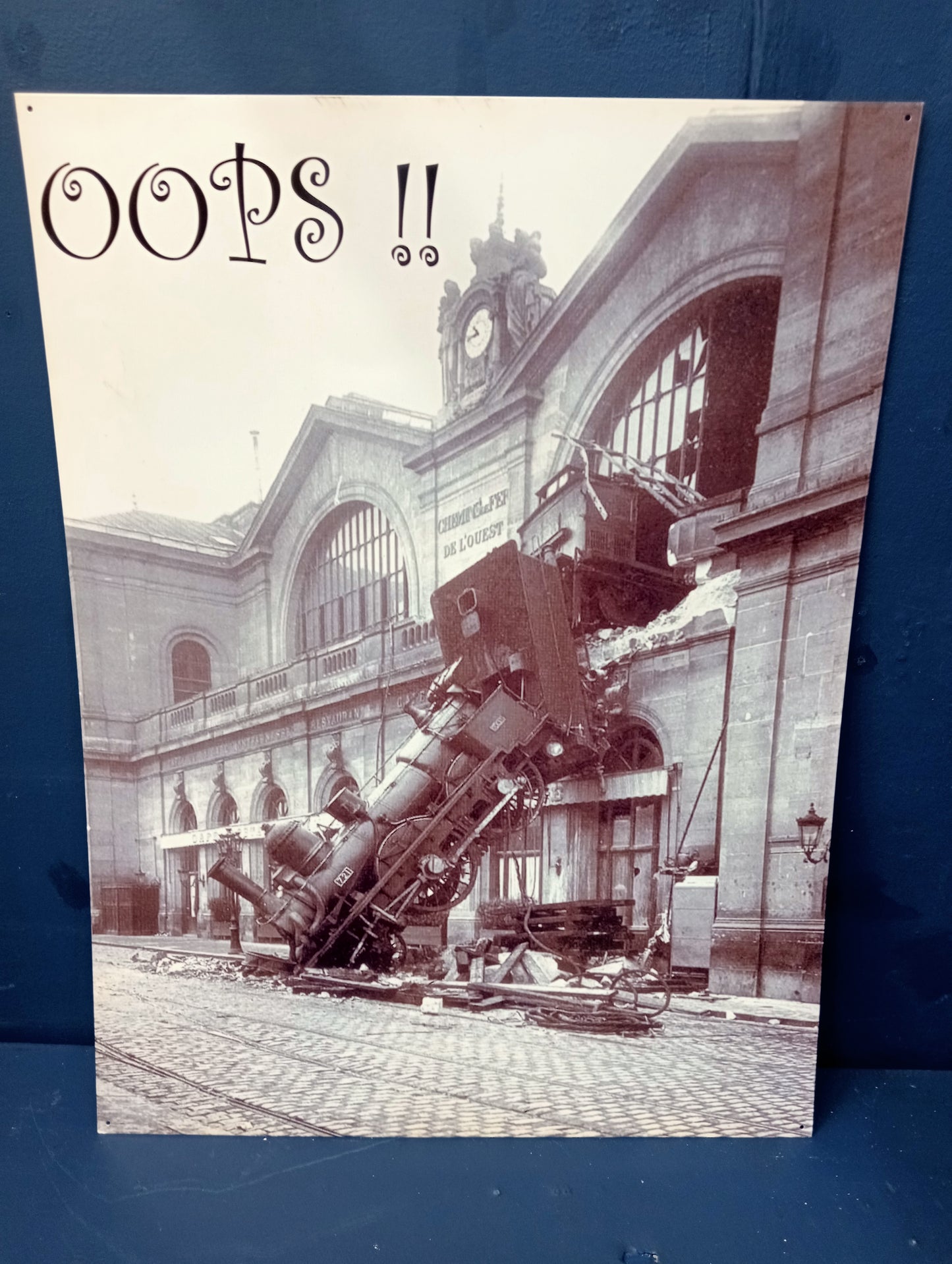 Oops train metal sign