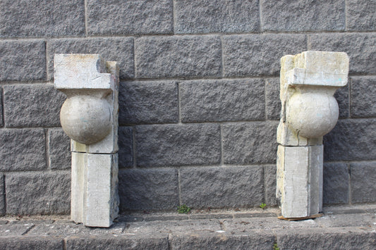 Pair of 19th C blue stone balcony corbels decorated with a ball