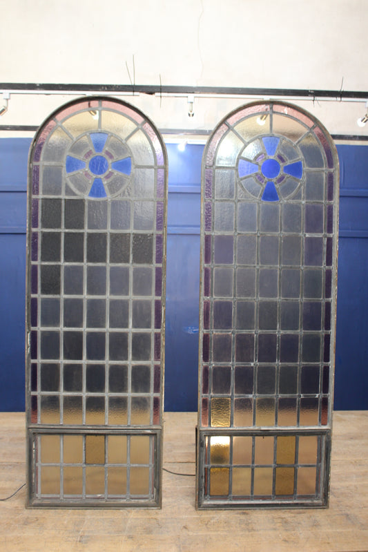 Pair of arched wrought iron leaded glass windows with opening to bottom in mint condition