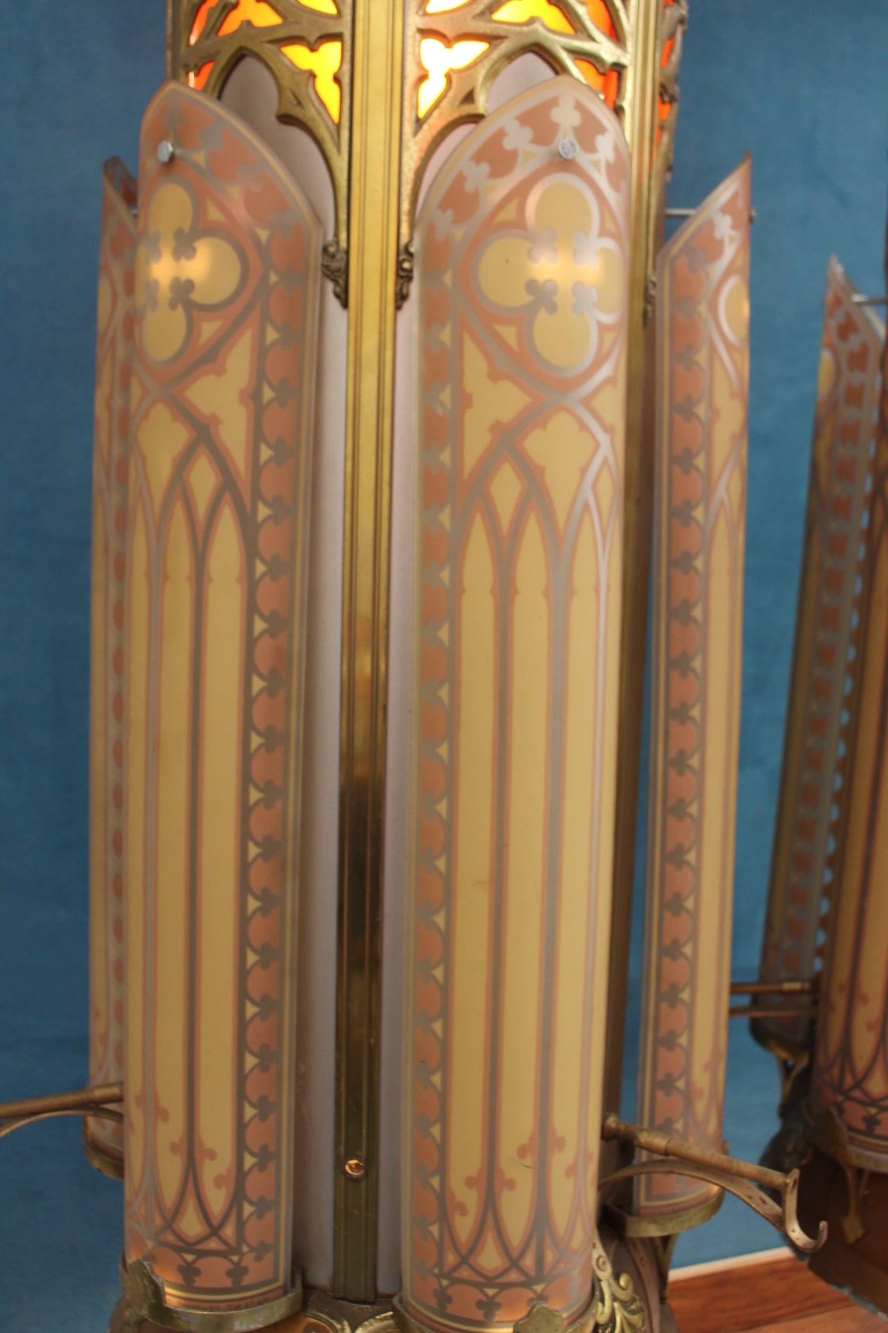 Pair of brass and glass hanging lanterns in gothic style