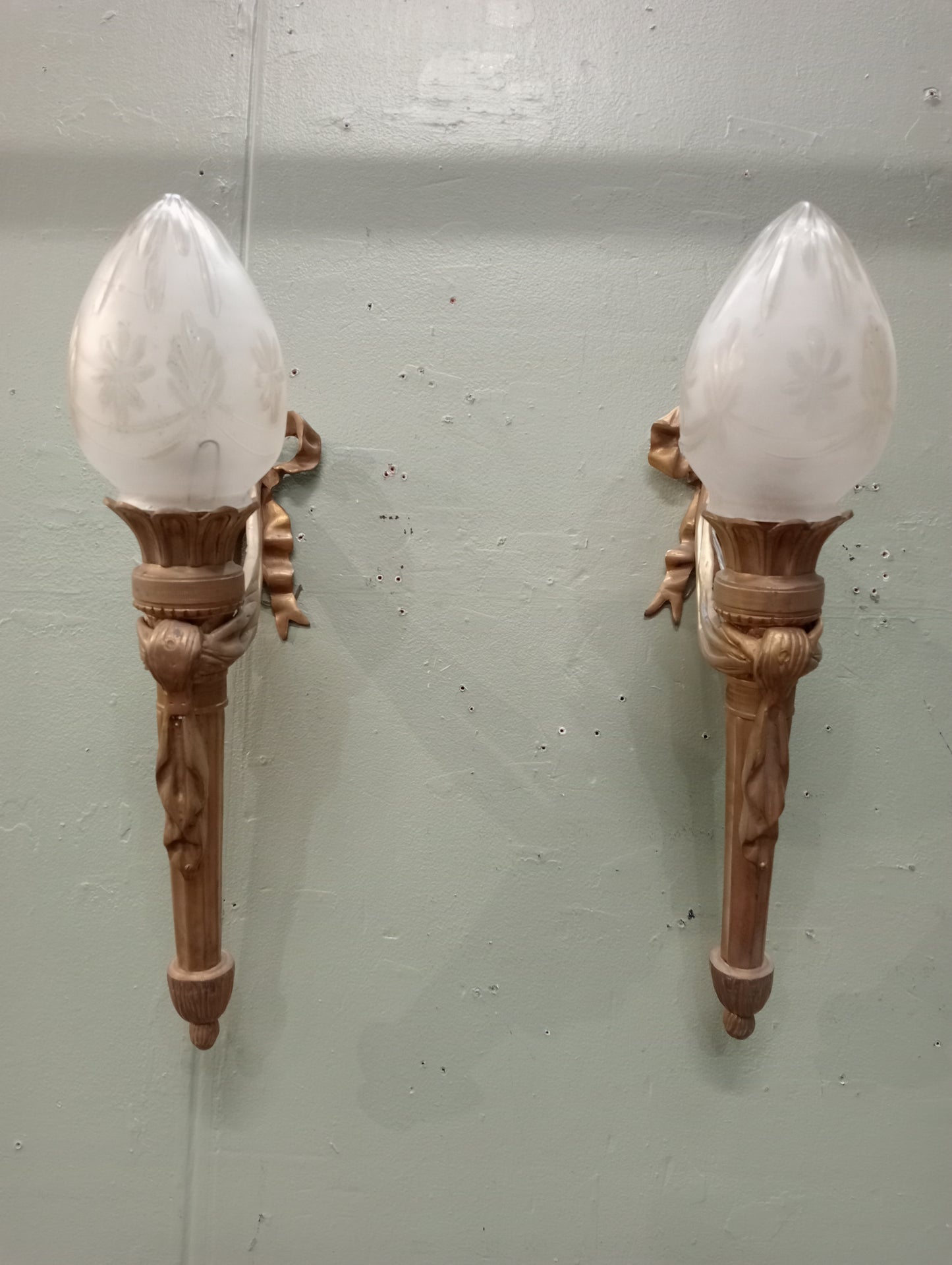Pair of brass torchiere wall lights circa 1930 with swag design