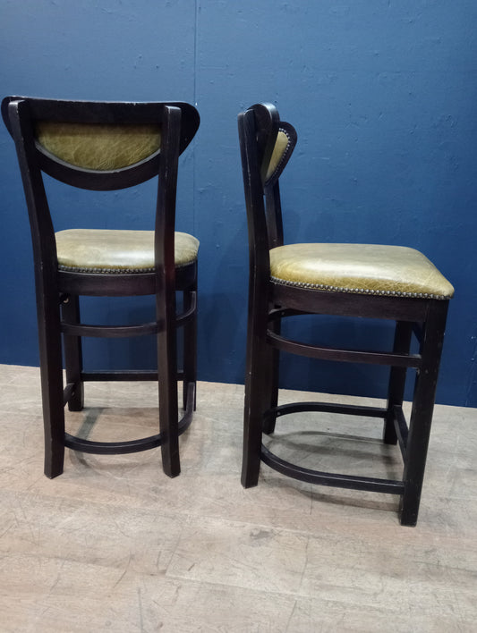 Pair of breakfast bar high stools green leather seat and back
