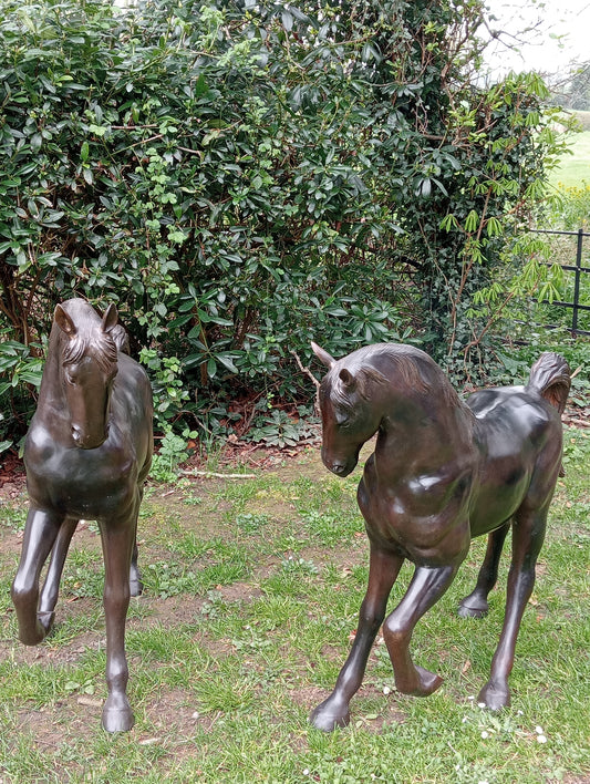 Pair of bronze foals