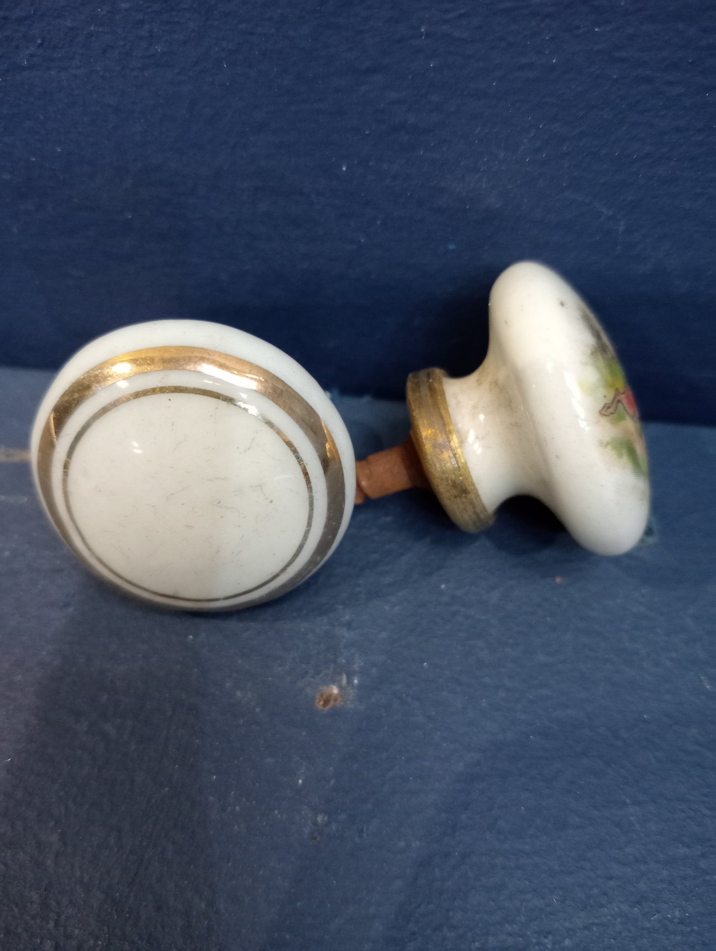 Pair of ceramic door knobs with dog