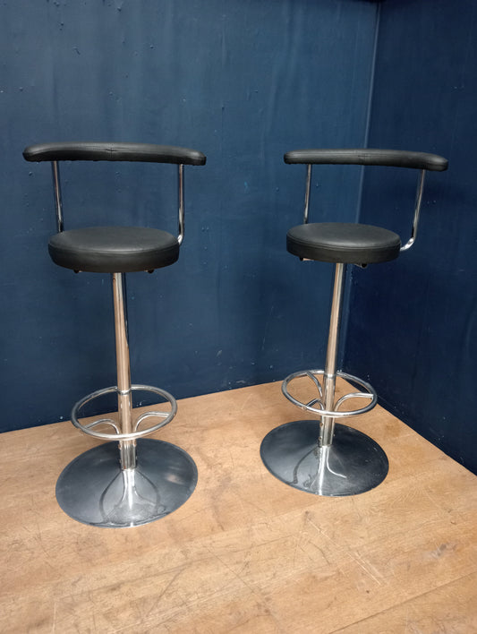 Pair of chrome and leather swivel  high bar stools