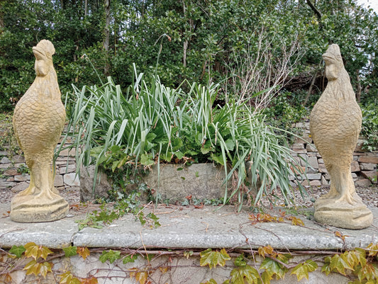 Pair of composition stone cocks