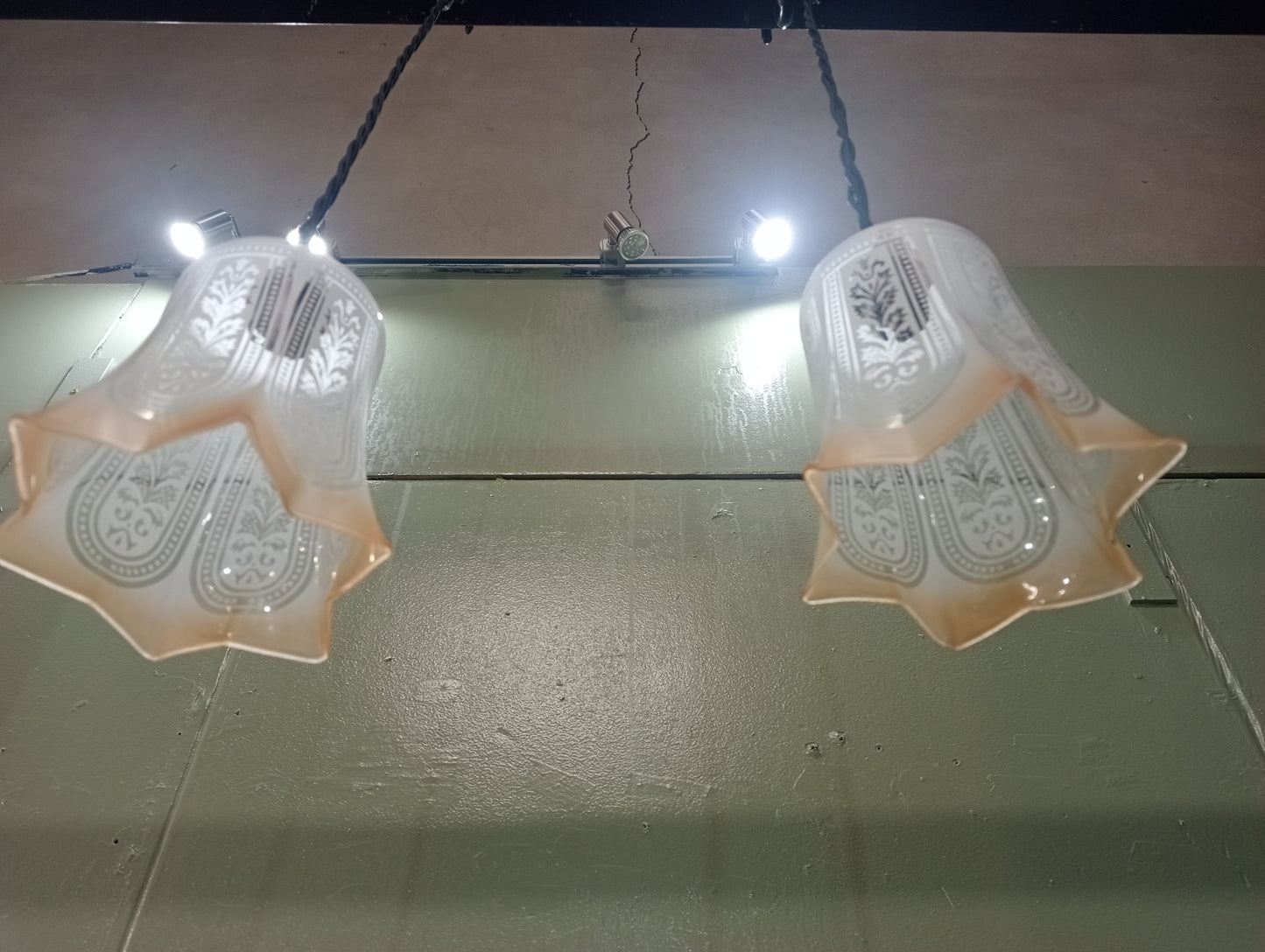 Pair of etched glass lights with bronze light fittings