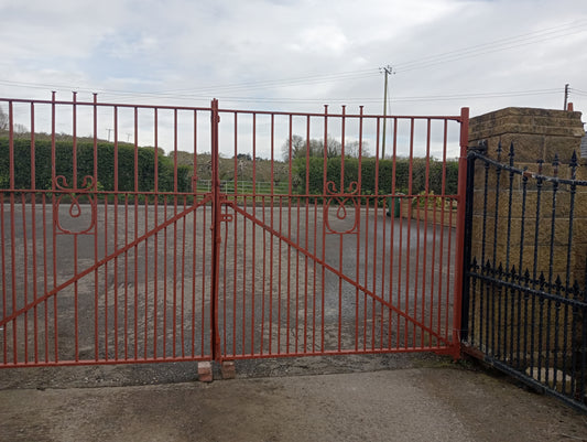 Pair of forged iron rivited entrance gates