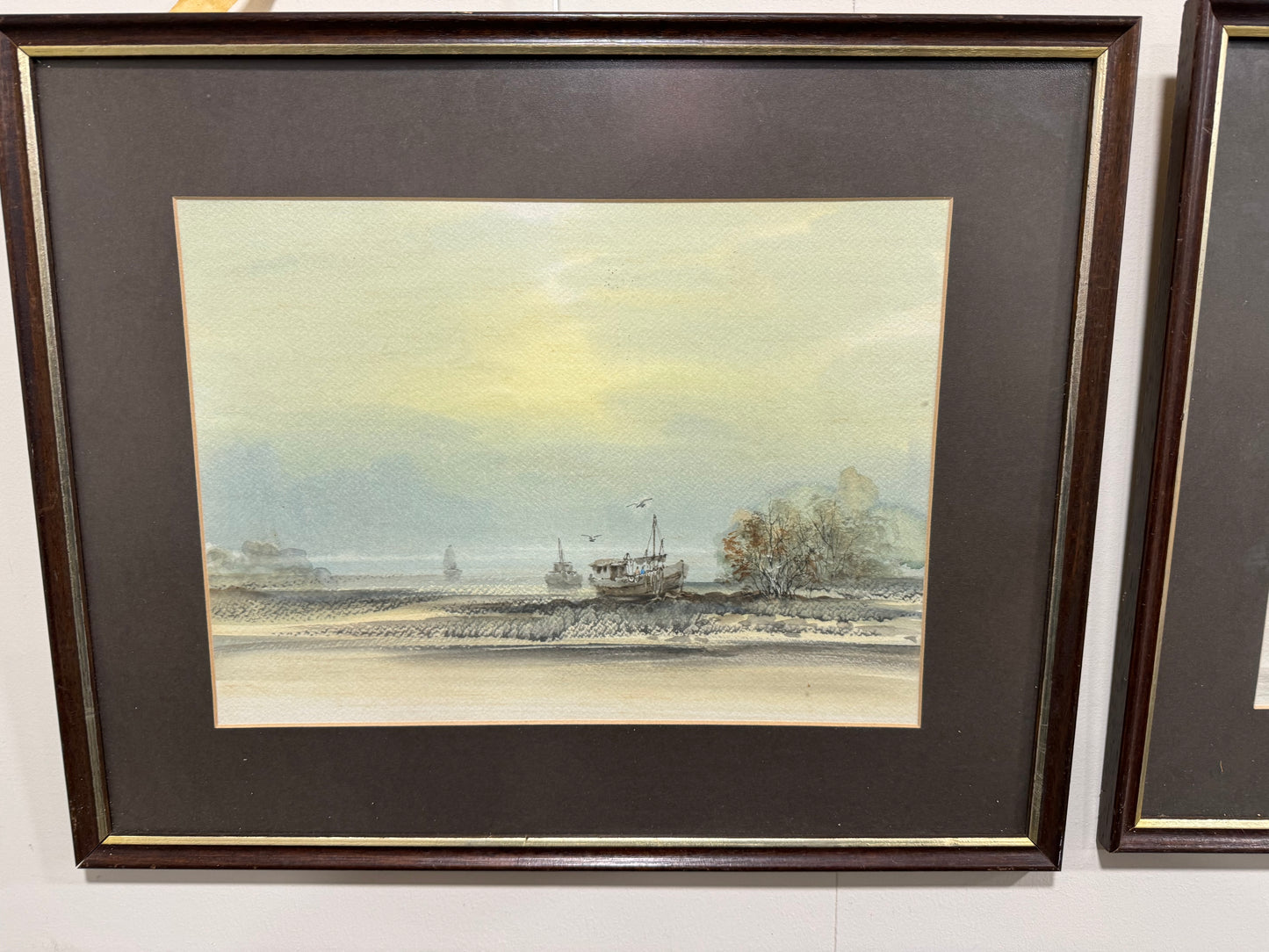 Pair of framed ship pictures