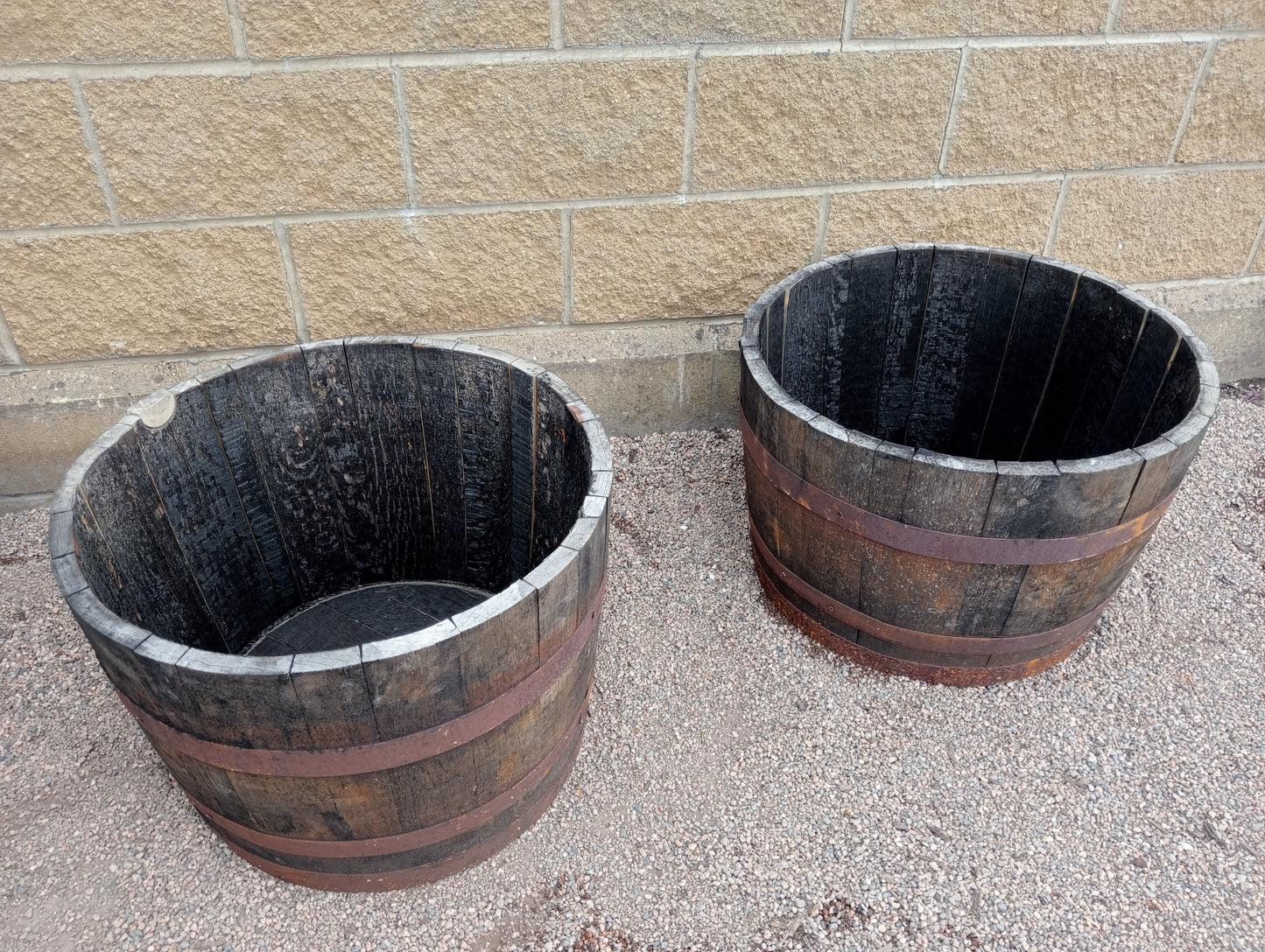 Pair of oak half barrels planters