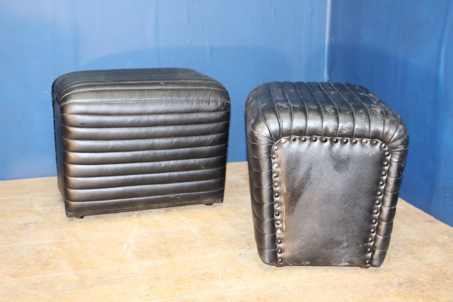 Pair of rectangular Black leather stools