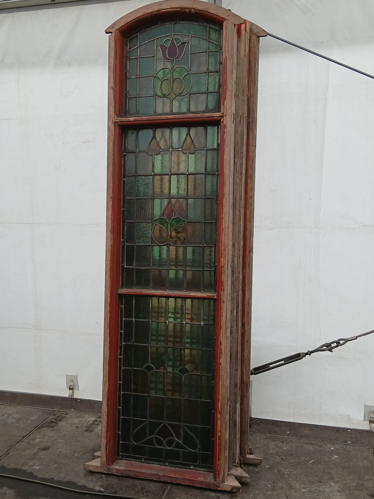 Pair of Large Reclaimed Arched Stained Glass Windows with Red Tulip Design
