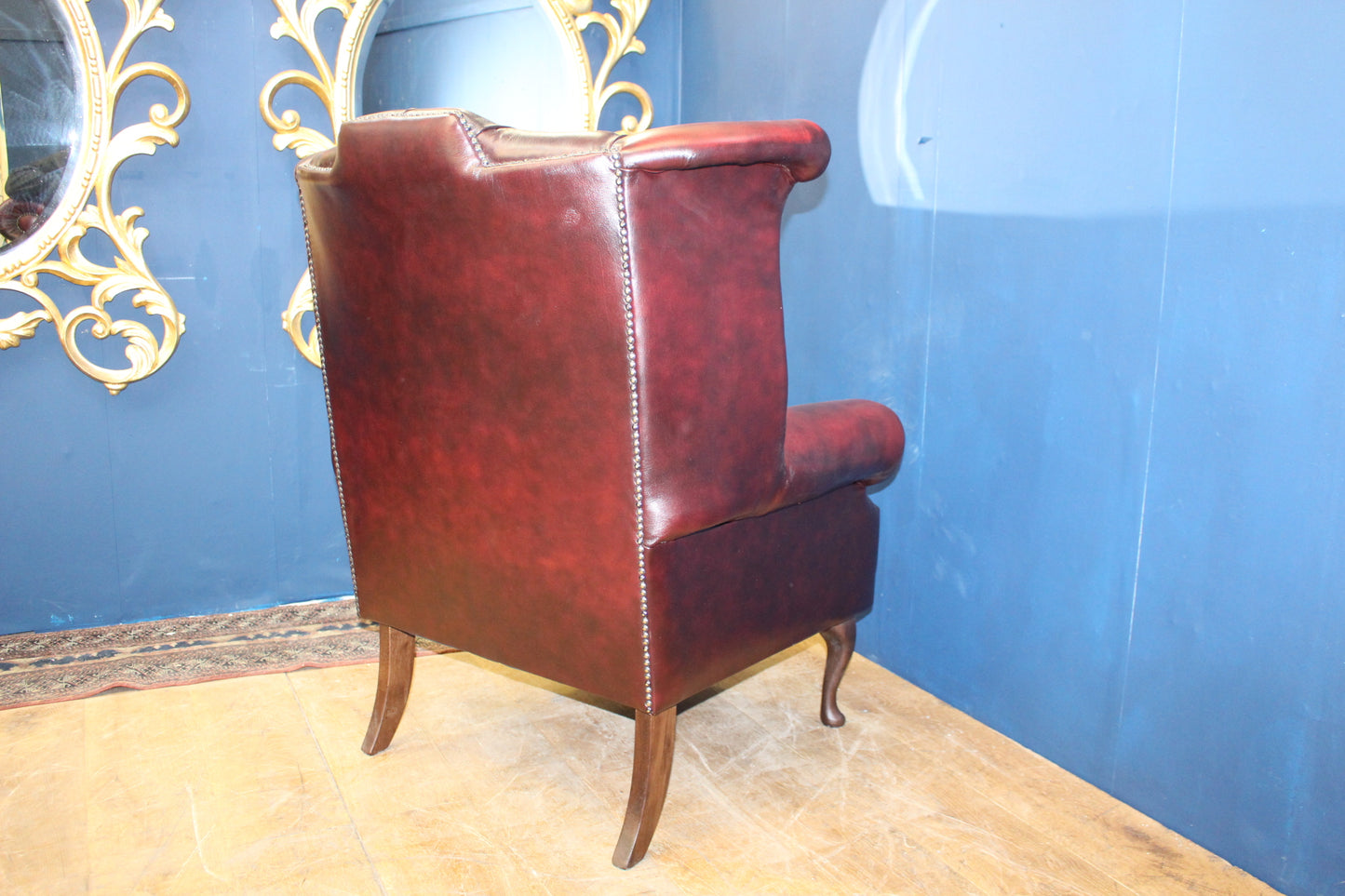 Queen Ann wingback leather armchair A