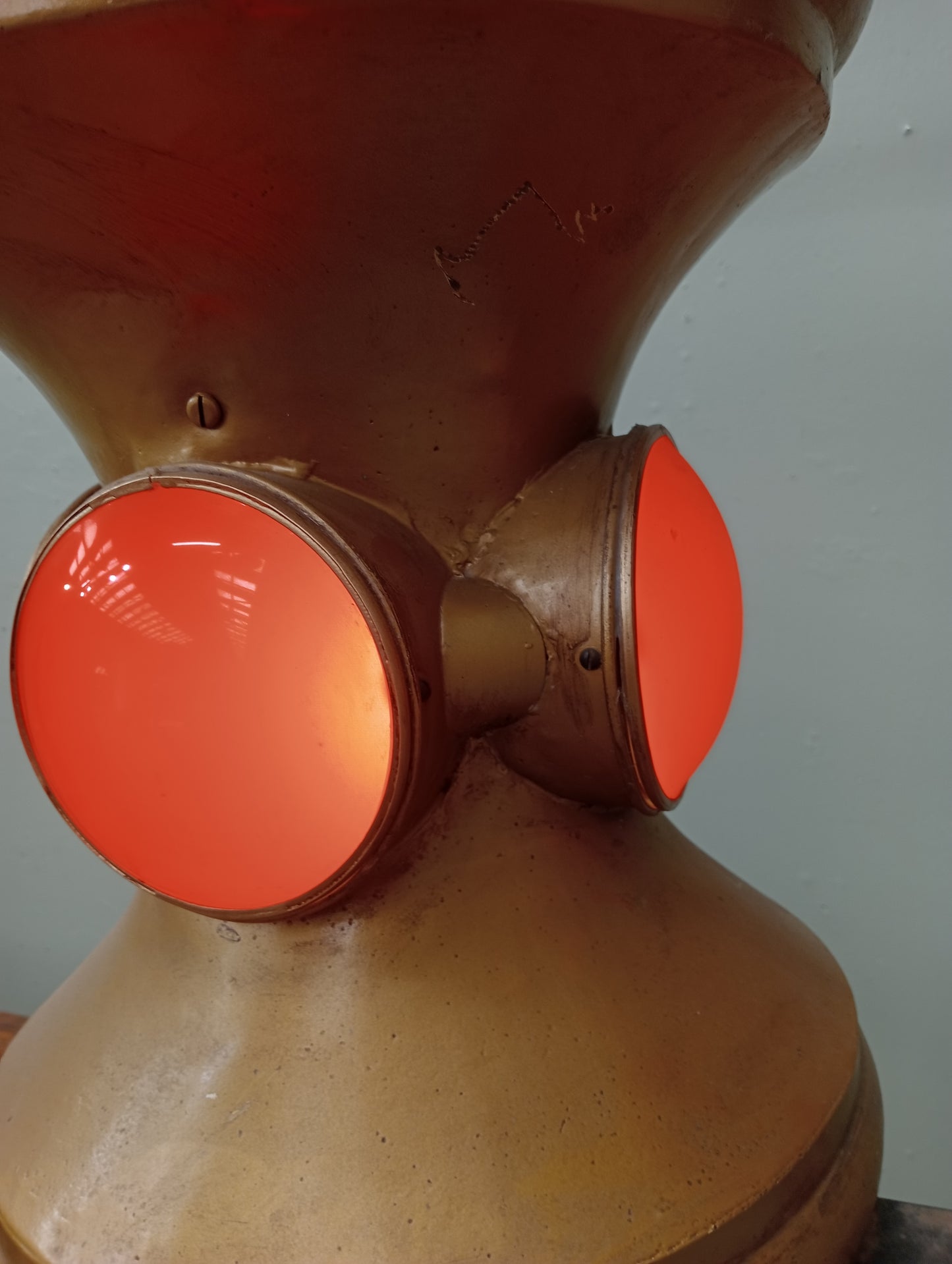 Rare early 20th C Pharmacy Trade Sign in the form of a mortar and pestle .In working order. Gilded colour with red lenses on 4 sides.