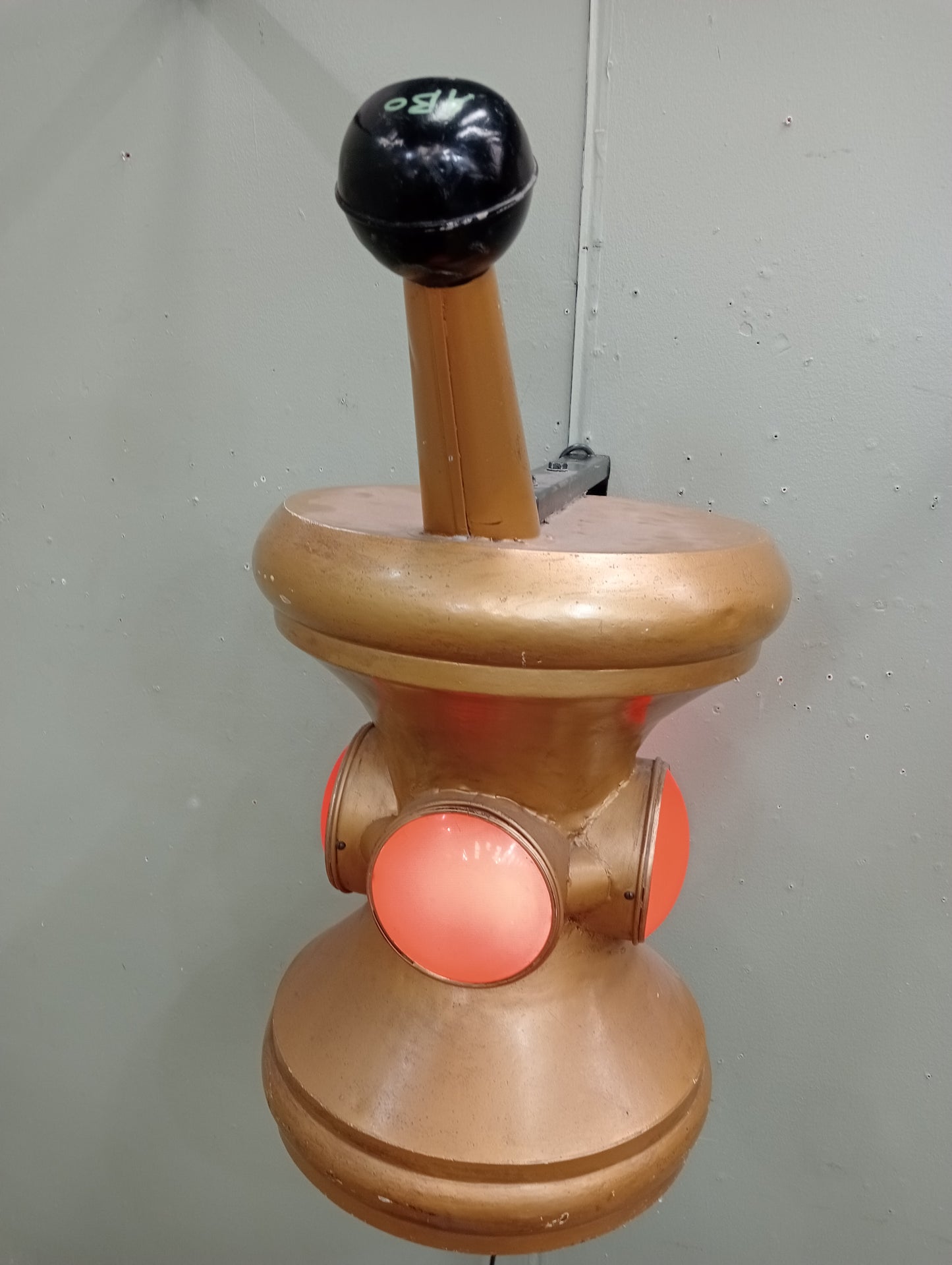 Rare early 20th C Pharmacy Trade Sign in the form of a mortar and pestle .In working order. Gilded colour with red lenses on 4 sides.