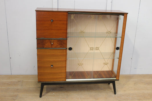 Retro teak display cabinet with glass sliding doors and three drawers
