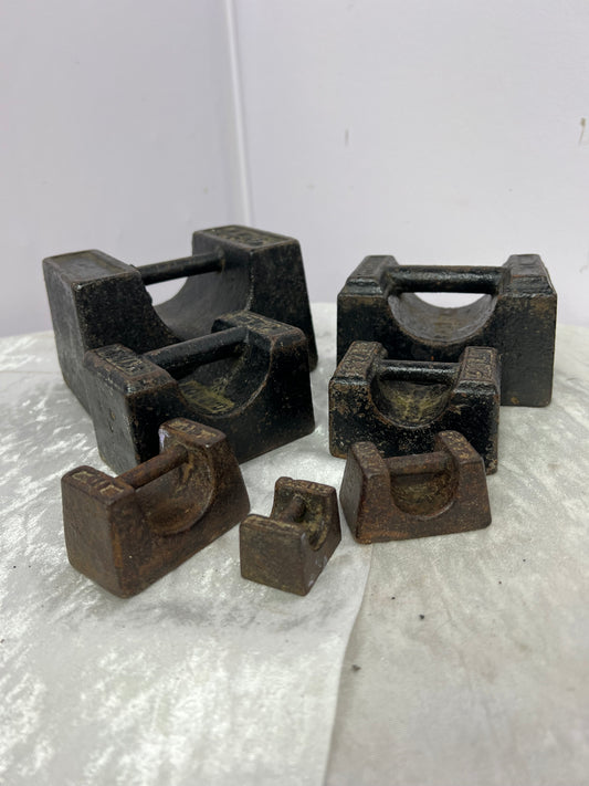 Set of 7 cast iron weights