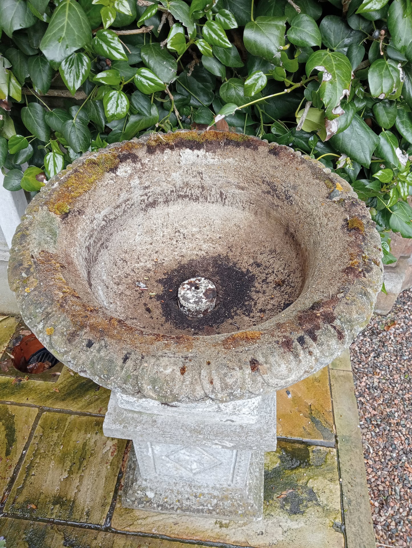 Stone urn on plinth