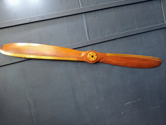 Teak and brass propeller