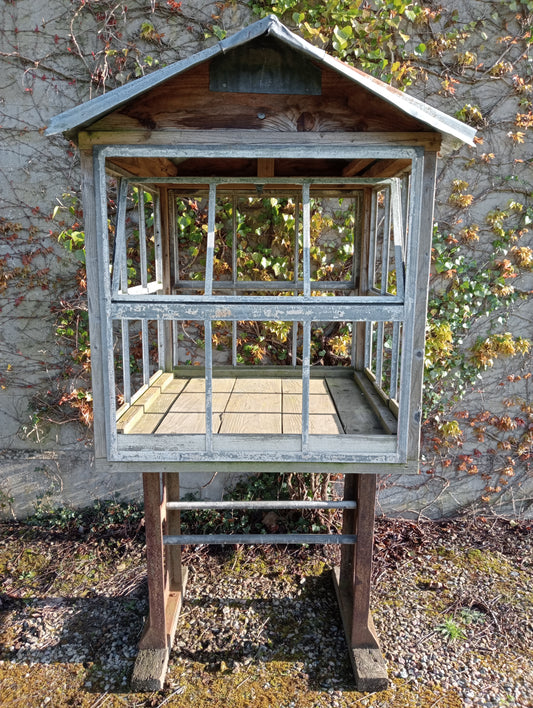 Victorian style greenhouse on cast iron machine base