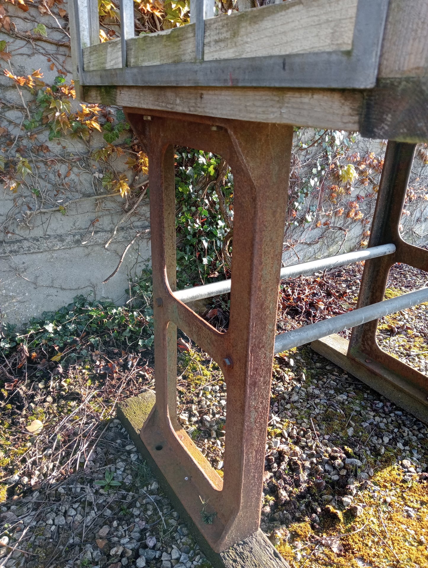 Victorian style greenhouse on cast iron machine base