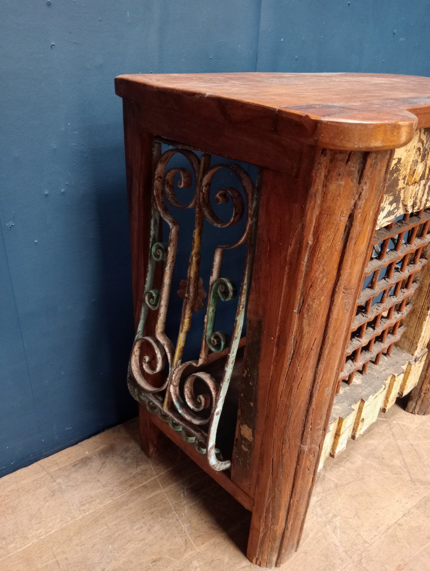 Wood and wrought iron radiator cover