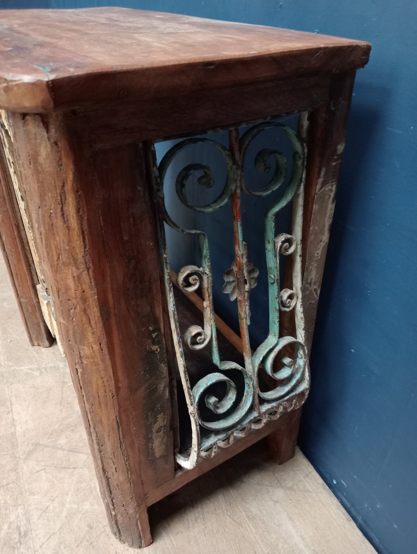 Wood and wrought iron radiator cover