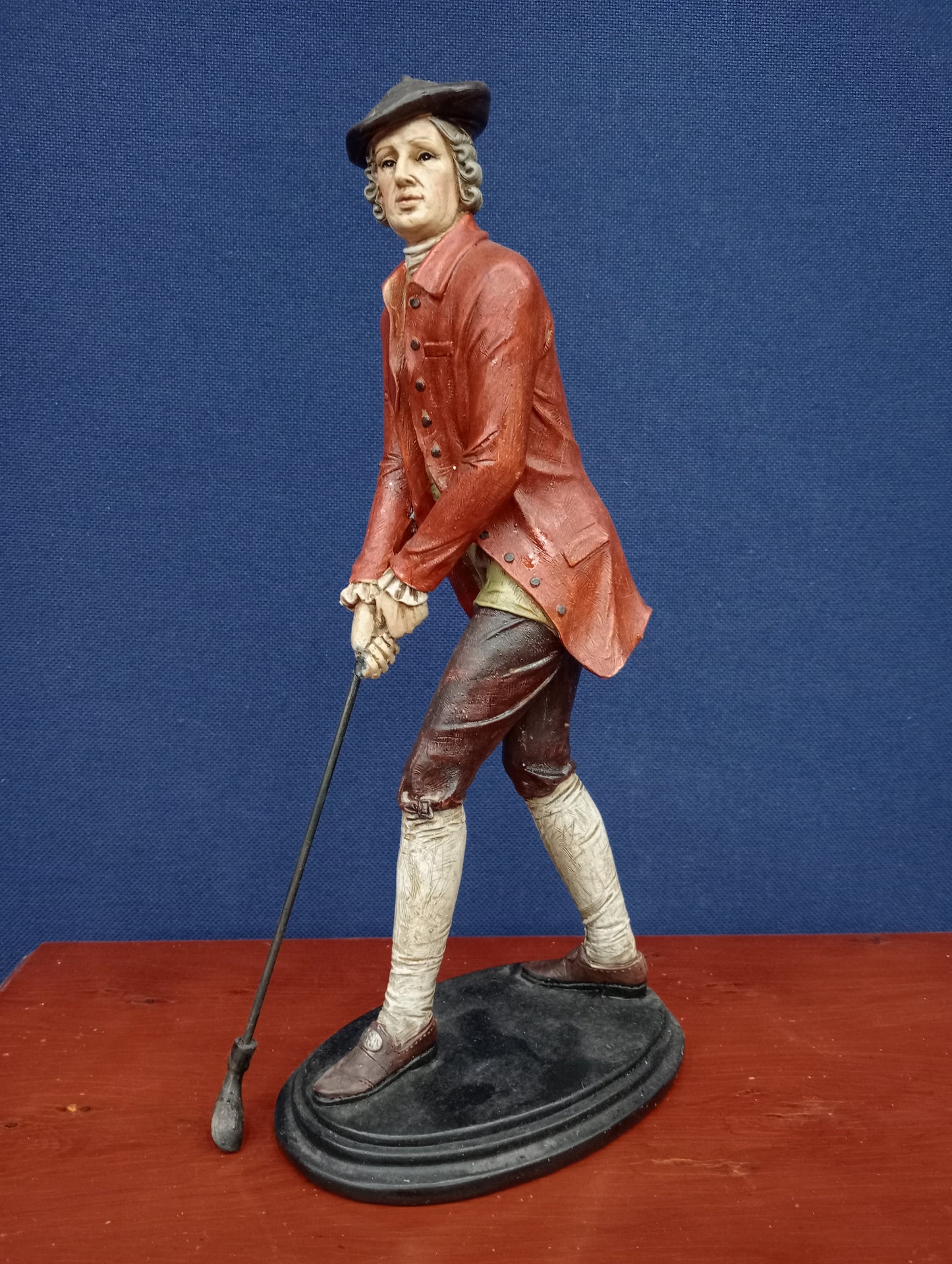 Wooden golfer figurine