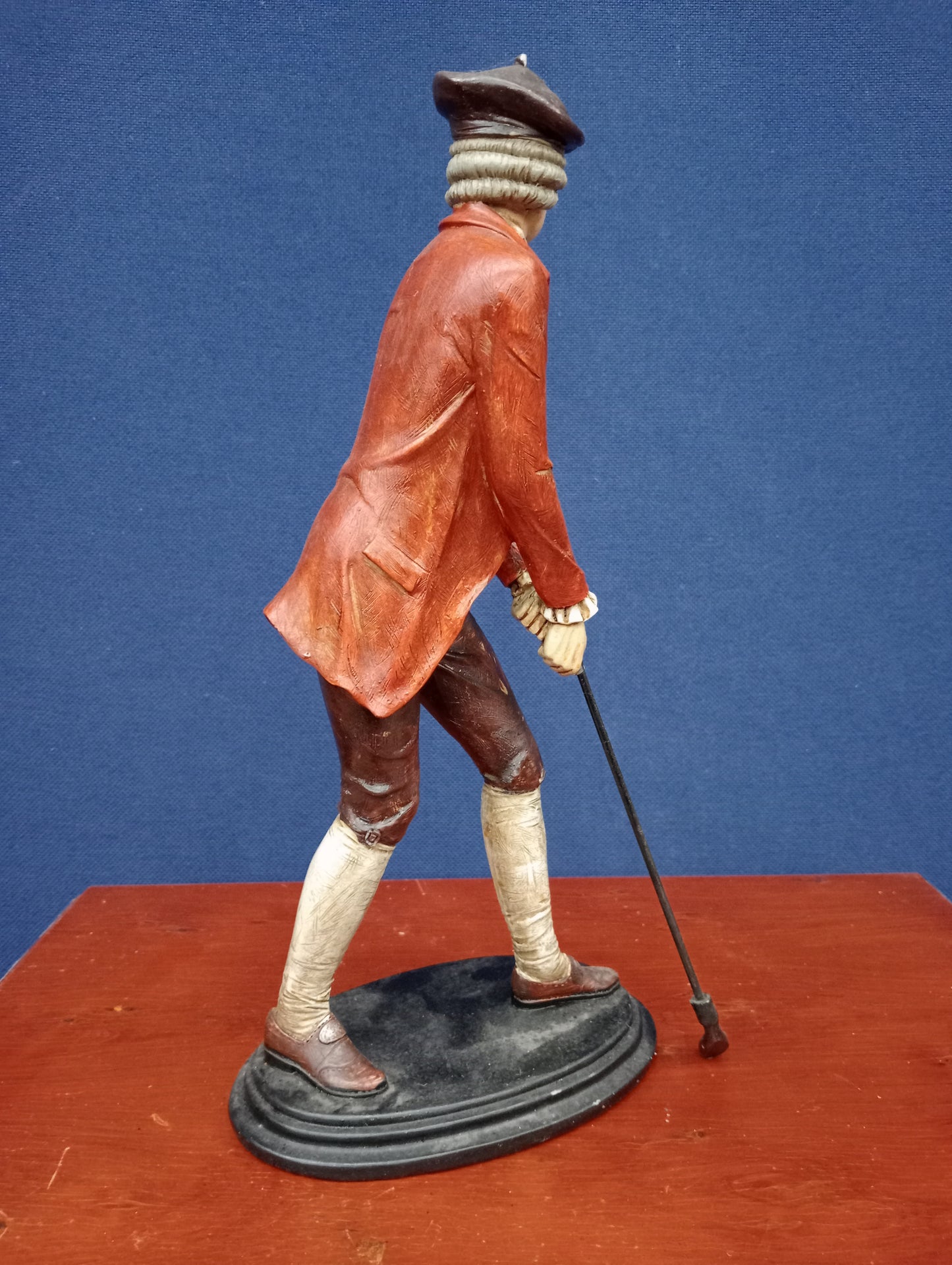 Wooden golfer figurine