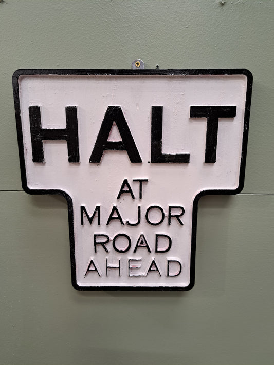 Wooden halt sign