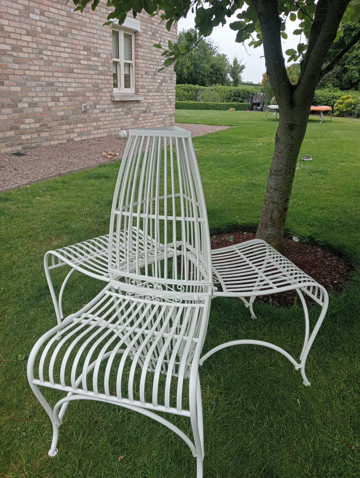 Wrought iron 3 seater conversation garden bench